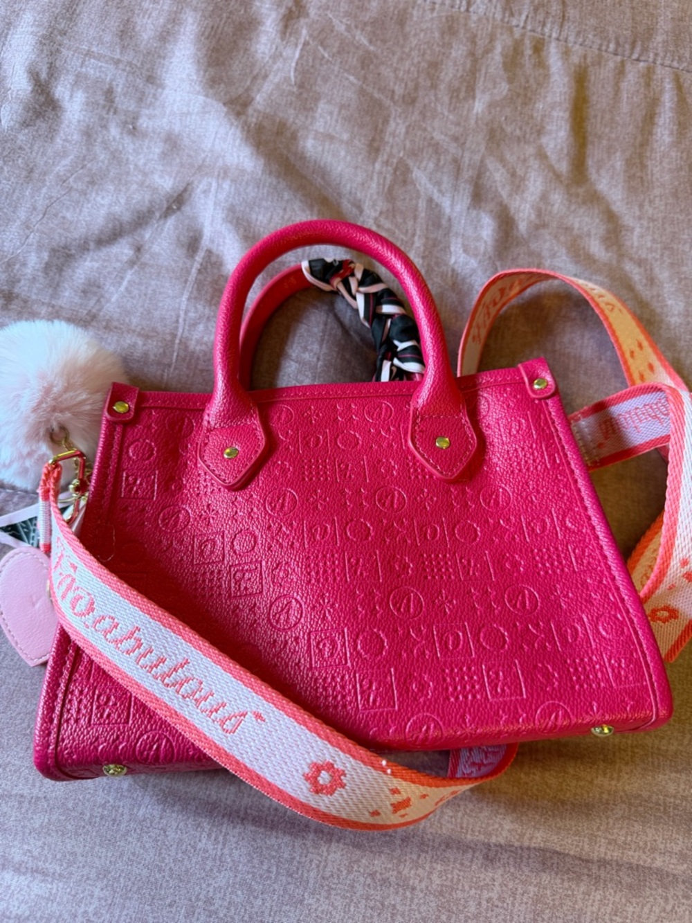 Pink Embossed Tote Bag with Patterned Strap